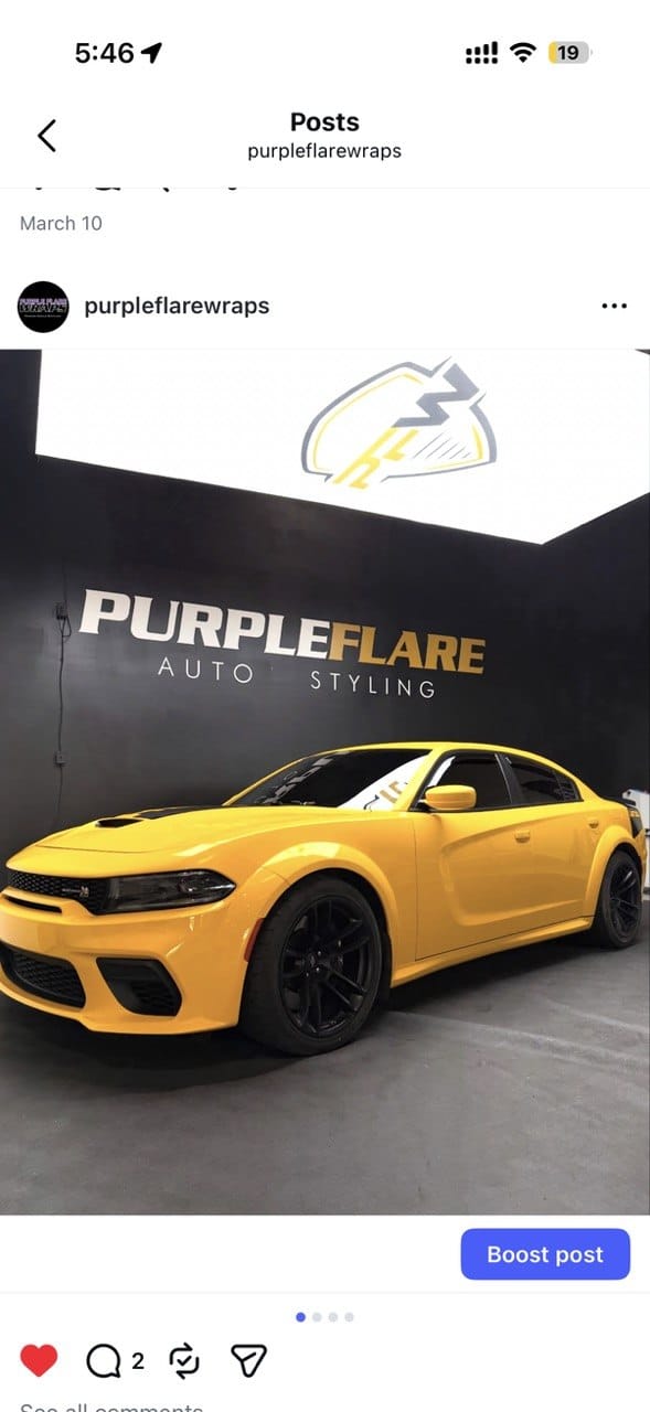 Yellow Dodge Charger custom wrap in front of Purple Flare Auto Styling branding Spring Valley Las Vegas