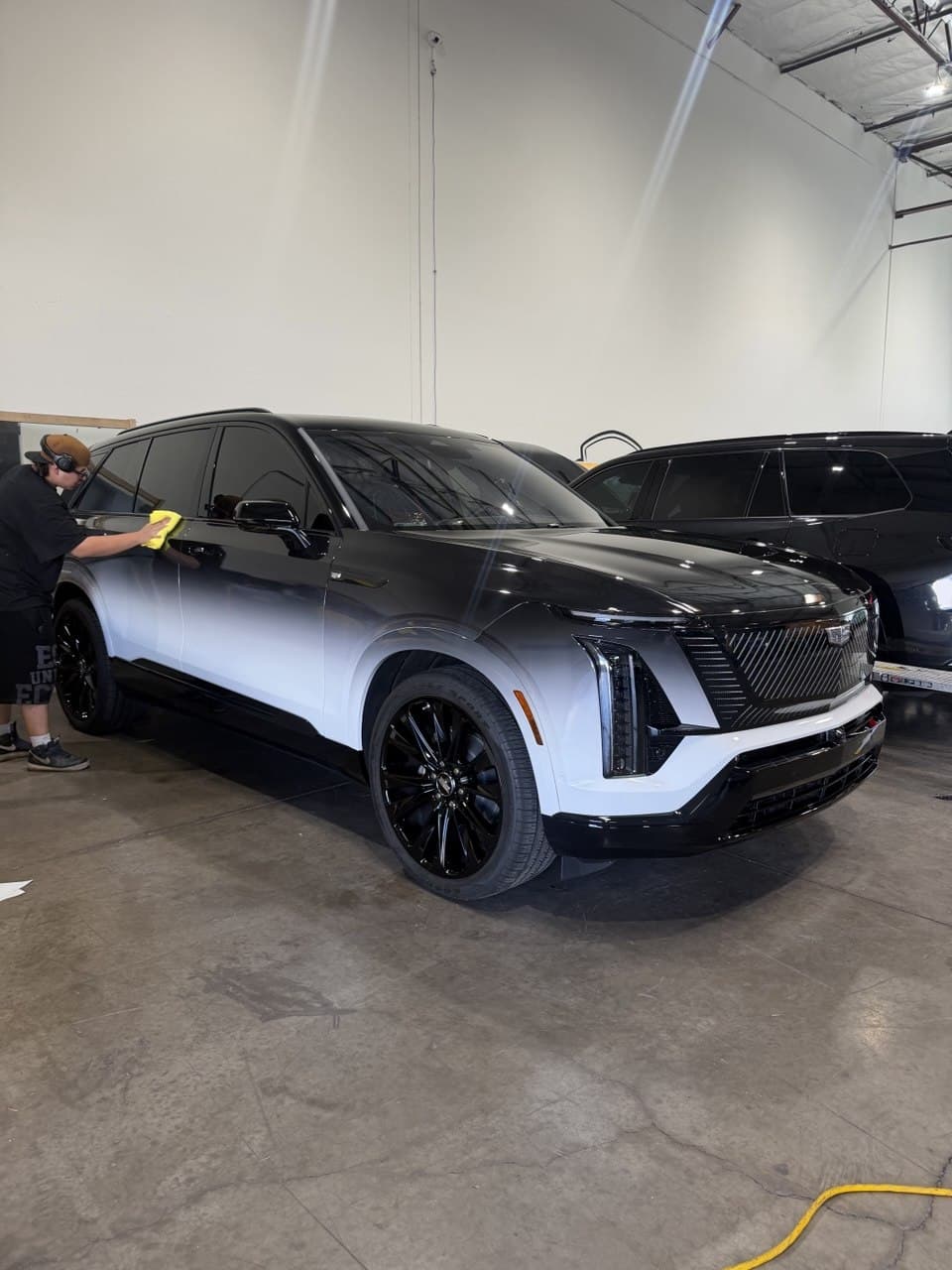 Black and white two-tone Cadillac Escalade IQ vinyl wrap at Purple Flare Wraps Henderson NV
