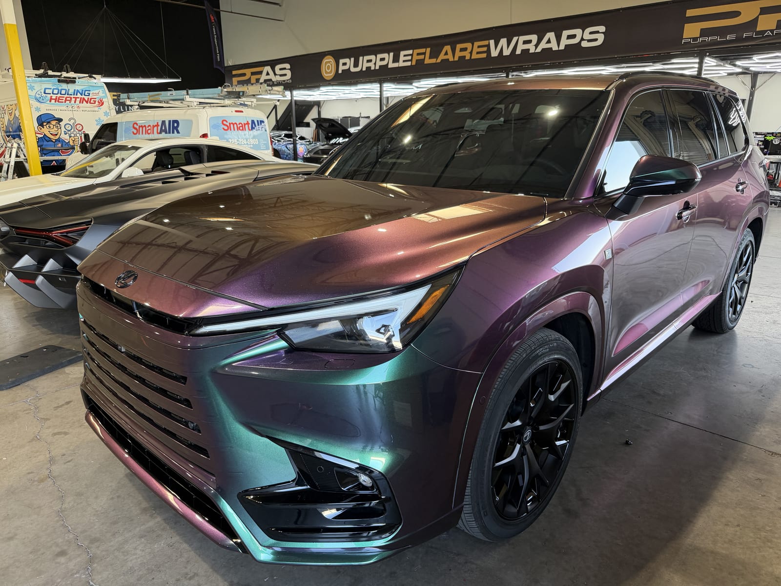 Lexus TX 350 receiving color paint protection film in Henderson NV