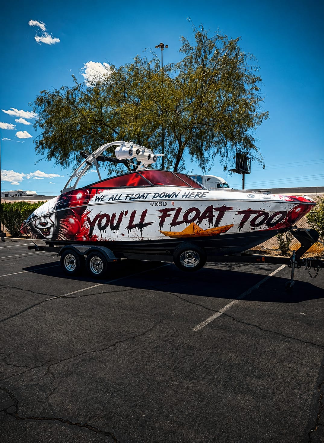 custom pennywise it boat wrap with transparent red windows installed at Vehicle Wraps Vegas Henderson NV